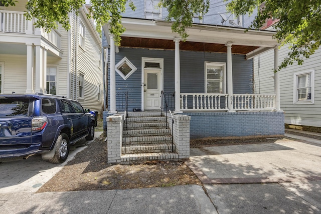 634 Rutledge Ave, Charleston, SC 29403 - view of front facade featuring covered porch