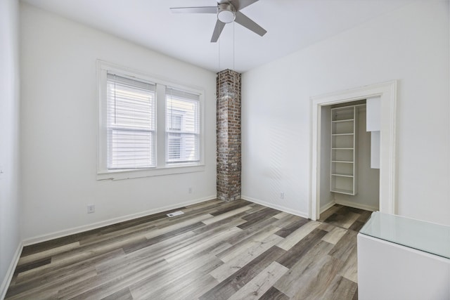 634 Rutledge Ave, Charleston, SC 29403 - unfurnished room featuring wood finished floors, ceiling fan, and baseboards