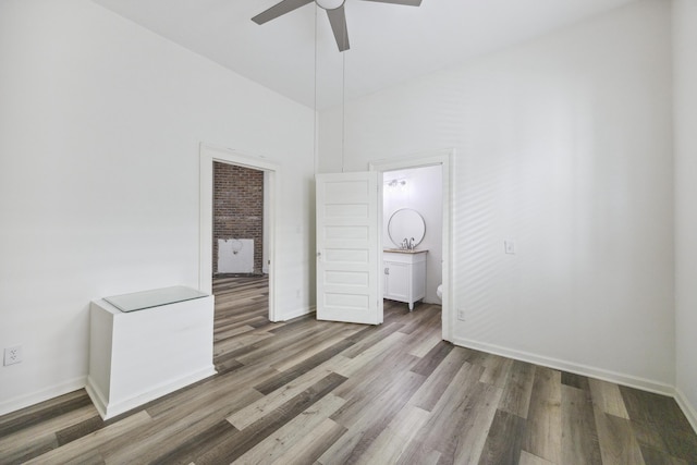 634 Rutledge Ave, Charleston, SC 29403 - spare room with ceiling fan, wood finished floors, baseboards, and a high ceiling