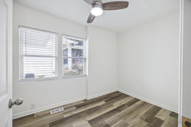 634 Rutledge Ave, Charleston, SC 29403 - empty room featuring wood finished floors, a ceiling fan, and baseboards