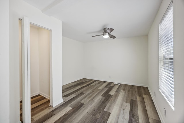 634 Rutledge Ave, Charleston, SC 29403 - empty room with healthy amount of natural light, a ceiling fan, wood finished floors, and baseboards