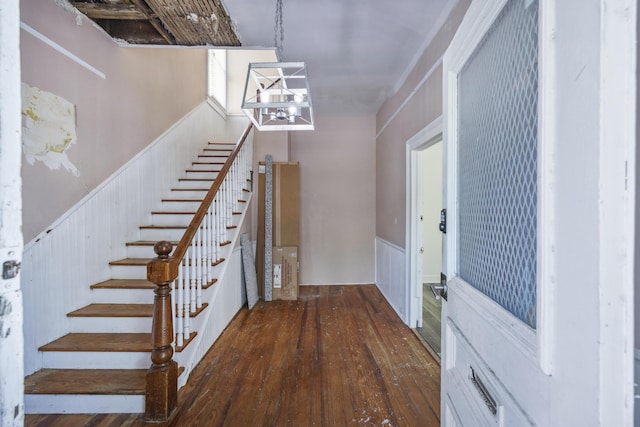 634 Rutledge Ave, Charleston, SC 29403 - entrance foyer with hardwood / wood-style floors, stairway, and a wainscoted wall