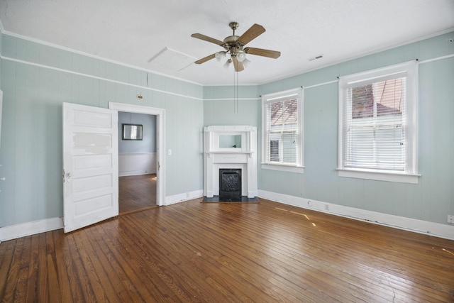 634 Rutledge Ave, Charleston, SC 29403 - unfurnished living room with hardwood / wood-style floors, ceiling fan, ornamental molding, a fireplace, and baseboards