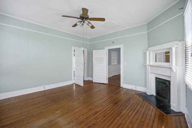 634 Rutledge Ave, Charleston, SC 29403 - unfurnished living room with a fireplace with raised hearth, wood finished floors, ceiling fan, crown molding, and baseboards