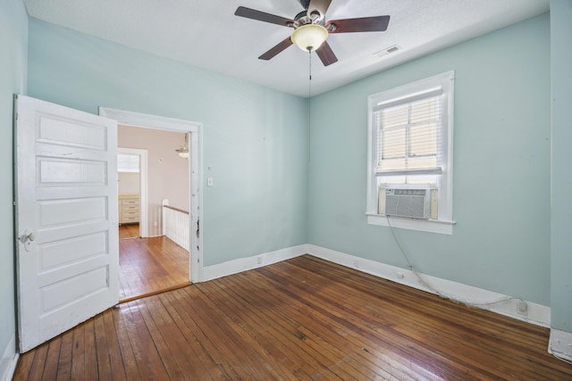 634 Rutledge Ave, Charleston, SC 29403 - unfurnished room with hardwood / wood-style flooring, cooling unit, a ceiling fan, and baseboards