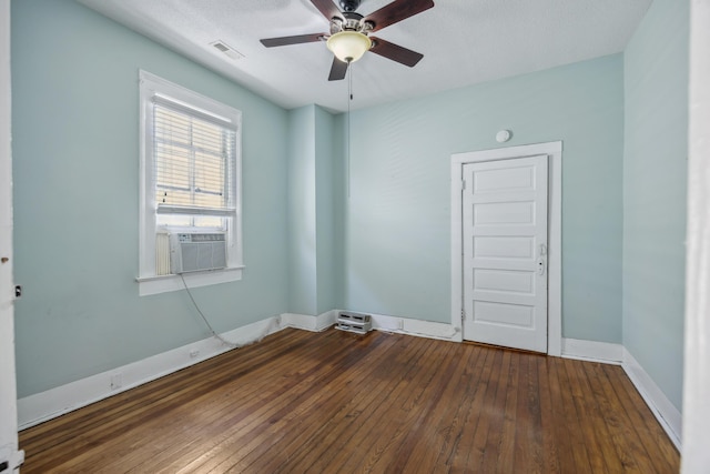 634 Rutledge Ave, Charleston, SC 29403 - spare room with wood-type flooring, ceiling fan, baseboards, and a textured ceiling