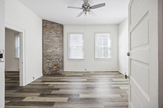 634 Rutledge Ave, Charleston, SC 29403 - empty room with ceiling fan, wood finished floors, and baseboards