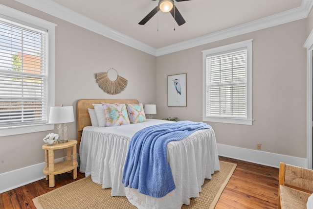 51/2 Kracke St Unit A, Charleston, SC 29403 - bedroom featuring crown molding, multiple windows, wood finished floors, and baseboards