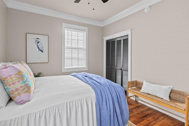 51/2 Kracke St Unit A, Charleston, SC 29403 - bedroom with ornamental molding, wood finished floors, a closet, and a ceiling fan