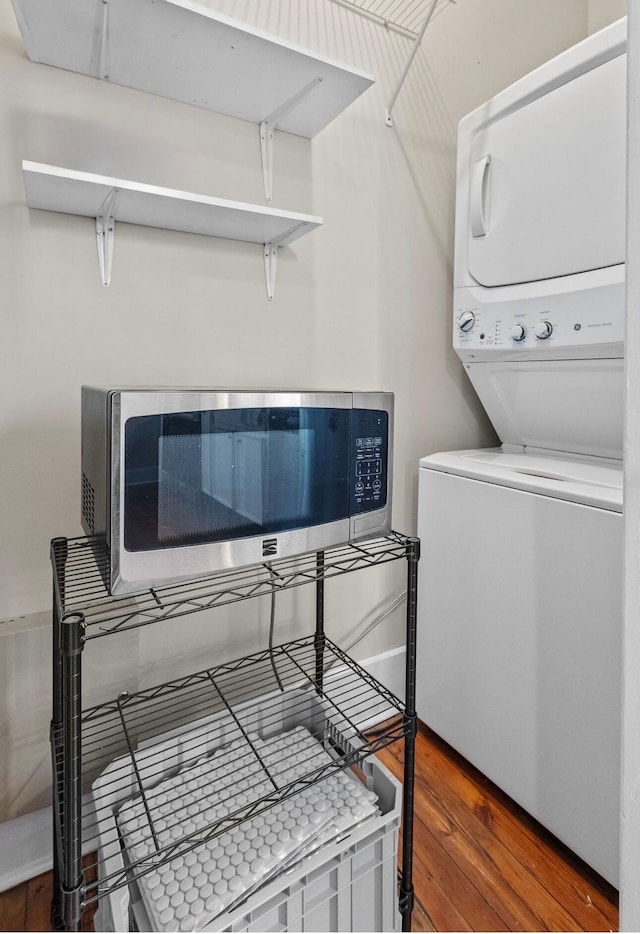 51/2 Kracke St Unit A, Charleston, SC 29403 - laundry room featuring stacked washer / drying machine and wood finished floors