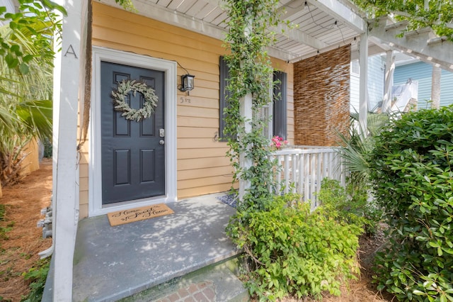 51/2 Kracke St Unit A, Charleston, SC 29403 - view of exterior entry featuring a porch