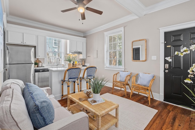 51/2 Kracke St Unit A, Charleston, SC 29403 - living room with healthy amount of natural light, a ceiling fan, dark wood-style flooring, crown molding, and baseboards