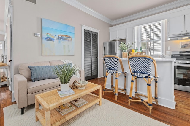 51/2 Kracke St Unit A, Charleston, SC 29403 - living area with ornamental molding and light wood finished floors
