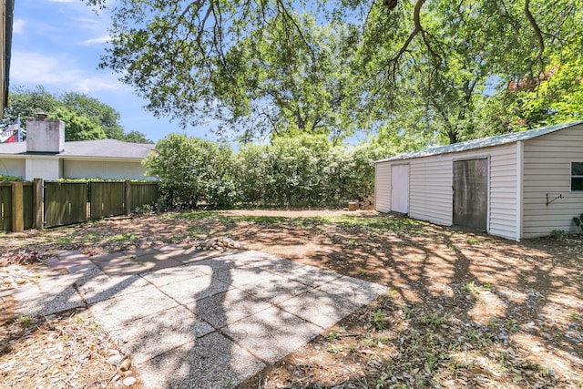 1143 Winborn Dr, Charleston, SC 29412 - view of yard with fence, an outdoor structure, and a patio area