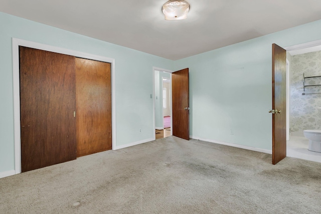 1143 Winborn Dr, Charleston, SC 29412 - unfurnished bedroom with carpet floors, baseboards, ensuite bath, and a closet