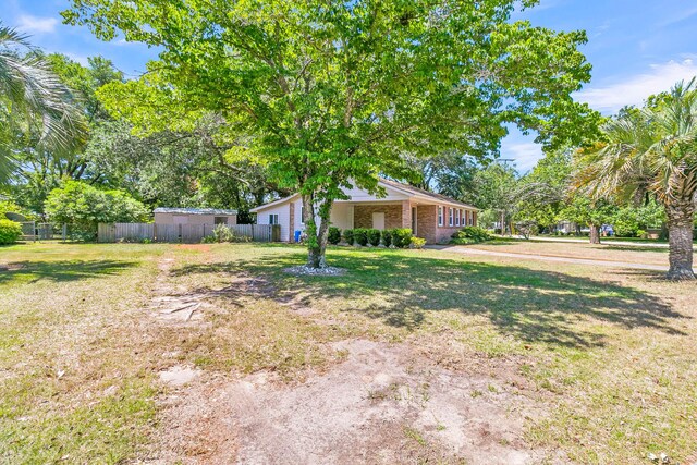 1143 Winborn Dr, Charleston, SC 29412 - view of yard featuring fence
