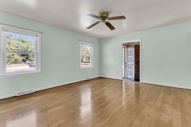 1143 Winborn Dr, Charleston, SC 29412 - empty room featuring visible vents, a ceiling fan, wood-type flooring, and baseboards