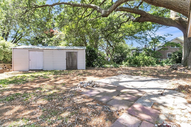 1143 Winborn Dr, Charleston, SC 29412 - exterior space featuring a storage shed, an outdoor structure, and a patio area