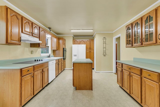 1143 Winborn Dr, Charleston, SC 29412 - kitchen with a sink, white appliances, under cabinet range hood, a kitchen island, and glass insert cabinets