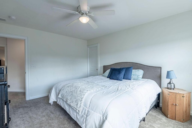 bedroom featuring ceiling fan and carpet flooring