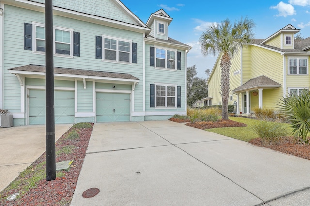 view of front of property with a garage