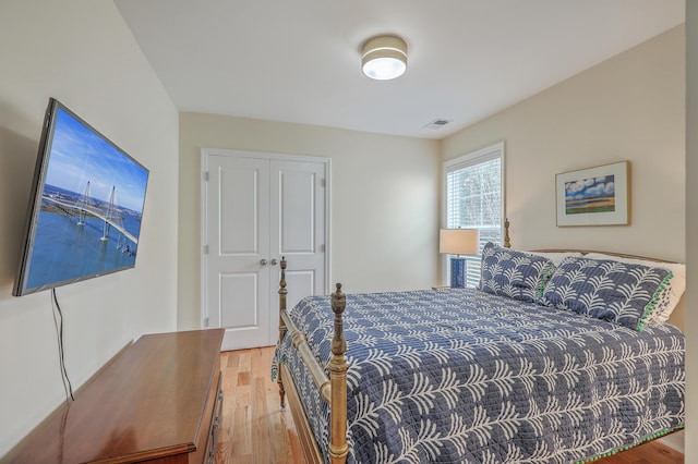 bedroom featuring hardwood / wood-style flooring