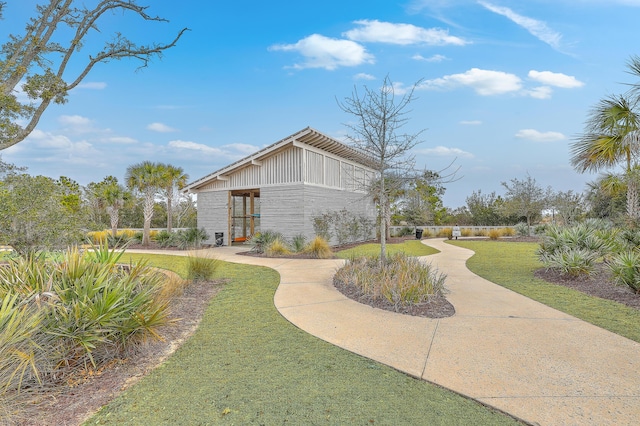 exterior space featuring a lawn