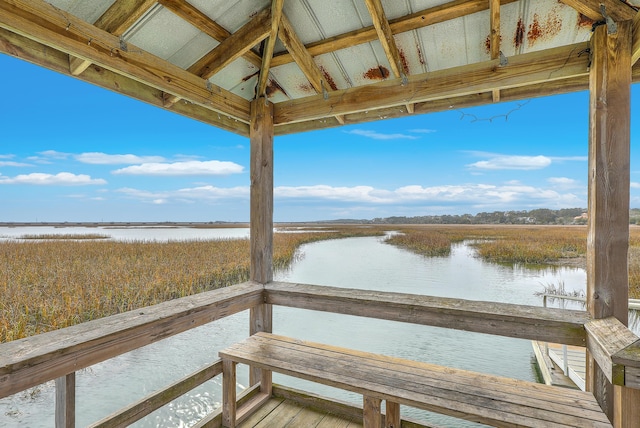 dock area with a water view