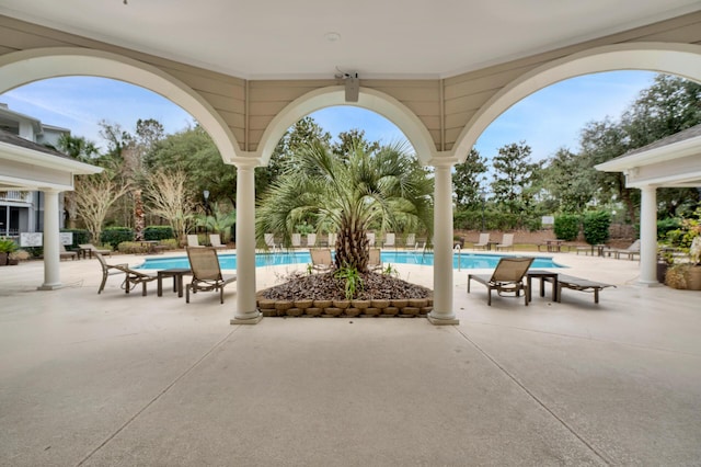 view of swimming pool featuring a patio