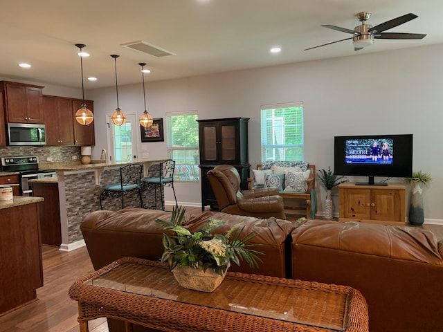 3808 Tupelo Branch Row, Mount Pleasant, SC 29429 - living room featuring wood finished floors, a ceiling fan, and recessed lighting