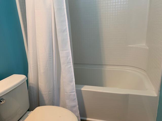 3808 Tupelo Branch Row, Mount Pleasant, SC 29429 - bathroom featuring toilet and shower / bath combination with curtain