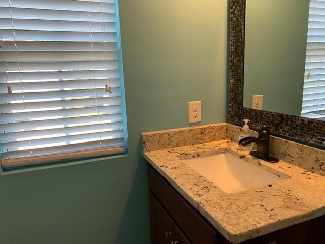 3808 Tupelo Branch Row, Mount Pleasant, SC 29429 - bathroom featuring vanity, tasteful backsplash, and healthy amount of natural light