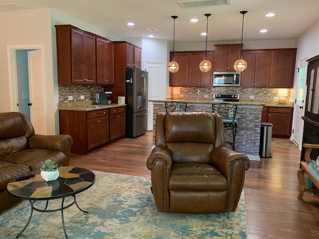 3808 Tupelo Branch Row, Mount Pleasant, SC 29429 - living area featuring dark wood-type flooring and recessed lighting