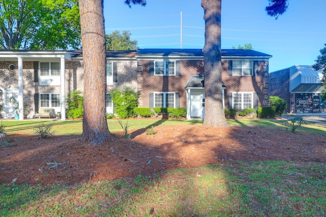 view of front facade with brick siding