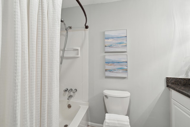 bathroom featuring vanity, shower / bath combo, baseboards, and toilet