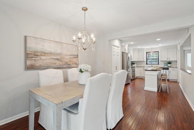 dining area with a chandelier, dark wood-style flooring, baseboards, and recessed lighting
