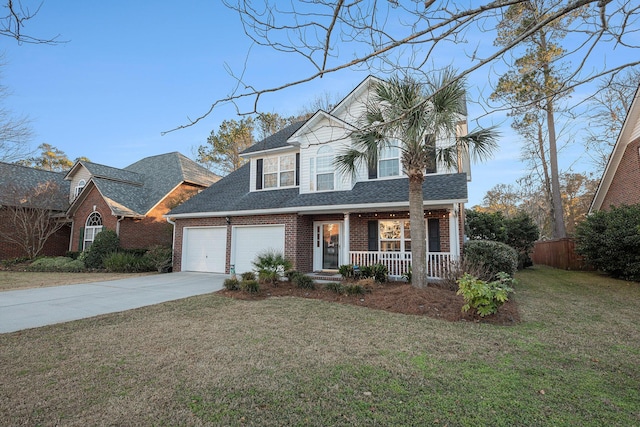 front of property featuring a garage, covered porch, and a front lawn