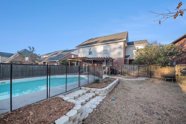 view of swimming pool with a pergola