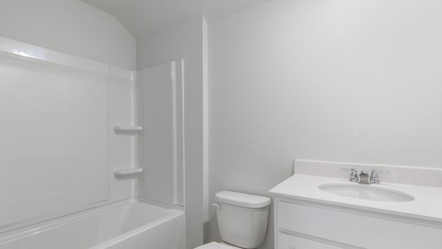 full bathroom featuring vanity, toilet, and  shower combination