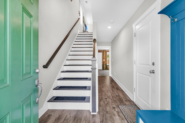 entrance foyer featuring dark wood-type flooring