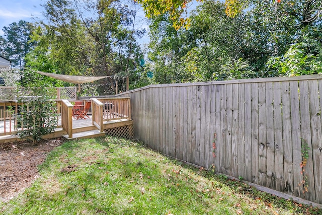 view of yard with a deck