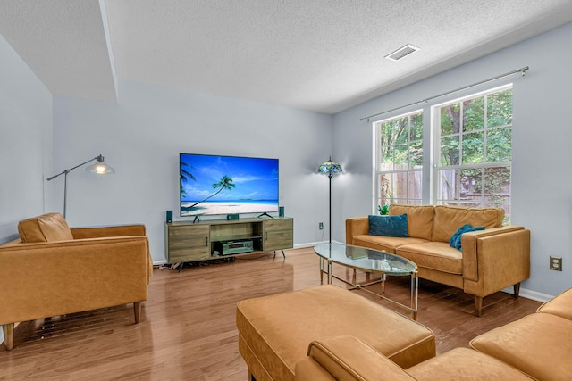 2773 Forest Dew Ct, Charleston, SC 29414 - living area with wood finished floors and a textured ceiling