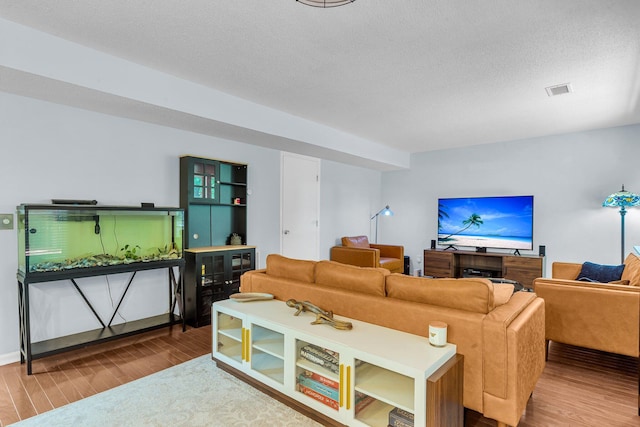 2773 Forest Dew Ct, Charleston, SC 29414 - living room featuring wood finished floors and a textured ceiling