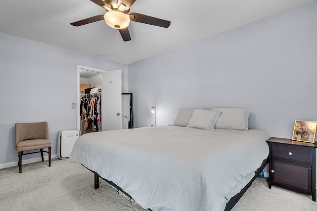 2773 Forest Dew Ct, Charleston, SC 29414 - bedroom featuring light carpet, a walk in closet, a ceiling fan, and a closet