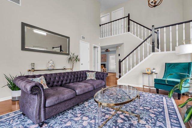 2773 Forest Dew Ct, Charleston, SC 29414 - living area featuring wood finished floors, stairs, and a high ceiling