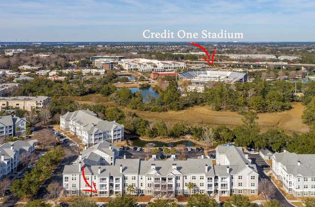 birds eye view of property featuring a water view