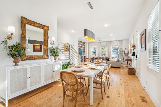 dining area featuring light wood-type flooring