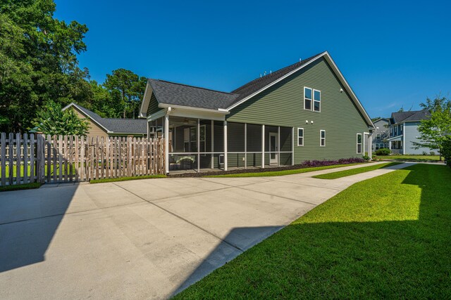 1607 Roustabout Way, Charleston, SC 29414 - back of property with a sunroom, ceiling fan, and roof with shingles