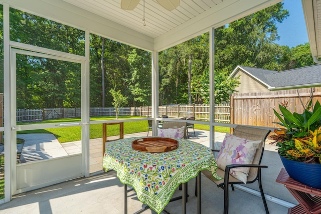 1607 Roustabout Way, Charleston, SC 29414 - sunroom with a ceiling fan, outdoor dining area, and view of wooded area