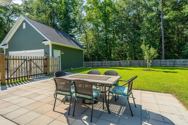 1607 Roustabout Way, Charleston, SC 29414 - fenced backyard featuring outdoor dining area, a patio area, and a gate